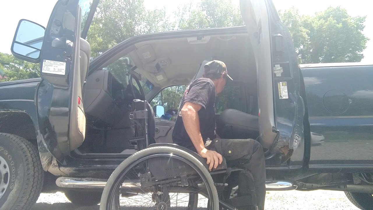 Paraplegic raise rear seat in extended cab truck YouTube
