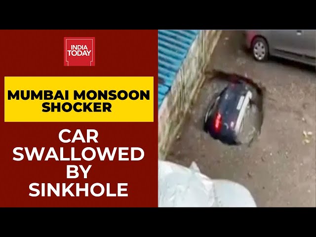 Viral Video: Car Swallowed By Sinkhole At Mumbai Parking Lot After Rain | Watch class=