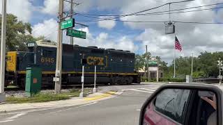 CSX GP40-2 LHF pulling hoppers westbound vid 2; Himes Ave