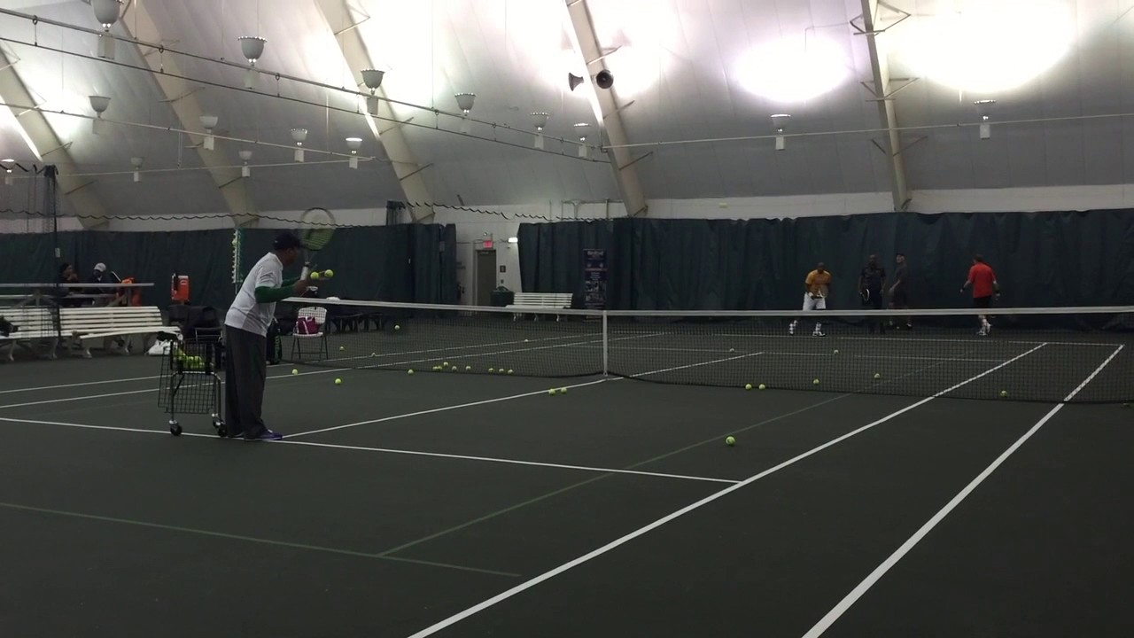 International Tennis Coach Stephen Peterson Working with 3.5 Men