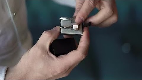 Man Put On Cufflinks Stock Video