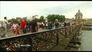 'Love locks' cause rail collapse on Paris bridge