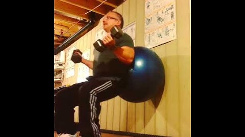 Wall Ball Squat Dumbbell Biceps Curl