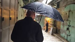 Heavy rain in the alleys of Jerusalem's Old City (David Street). Jerusalem, Israel 2019