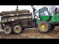 John Deere 1110E logging, slippery uphill