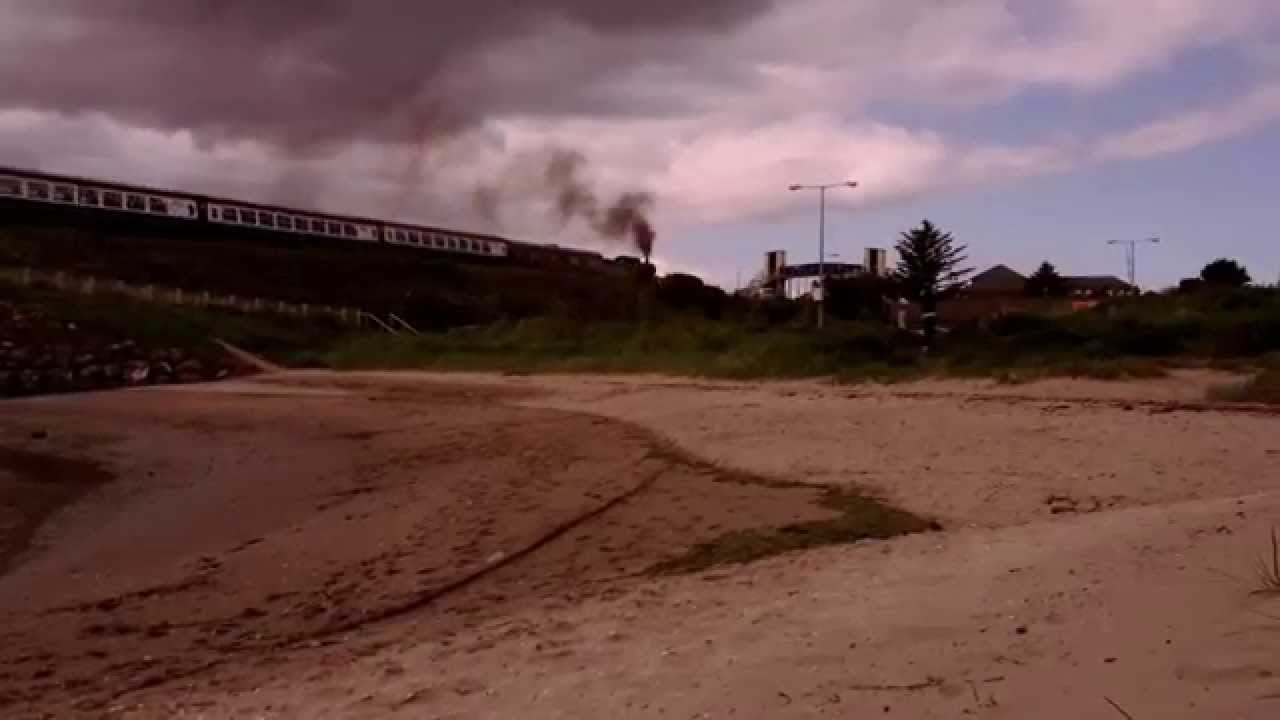 Steam train passing Laytown