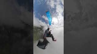 Paragliding Dog Enjoying the View Along with Its Owner