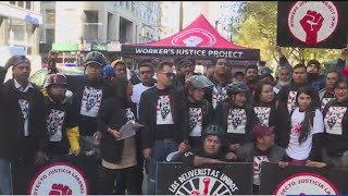 Delivery workers in NYC rally for $30 an hour minimum wage