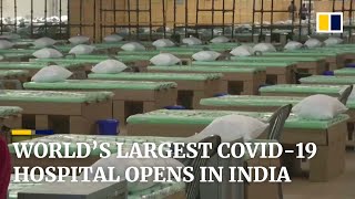 World’s largest temporary Covid-19 hospital opens in India as nation records record spike in cases