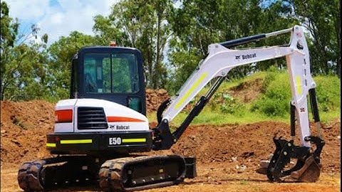Pulling STUMPS With Bobcat E50