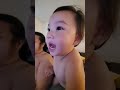 Zoey learns how to blow bubbles