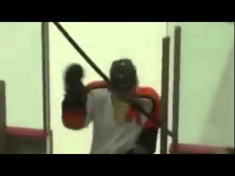 Hockey Player Gives Himself Clothesline From Hell With Own Stick (WWE Style)