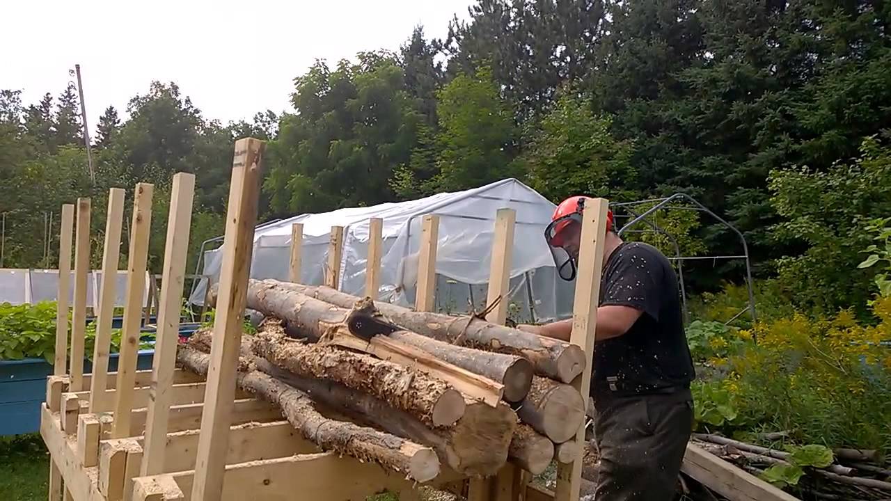 Firewood cutting rack DIY - YouTube