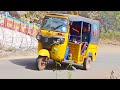Yellow auto rickshaw three wheeler driving on hill road  autos  crazy autowala
