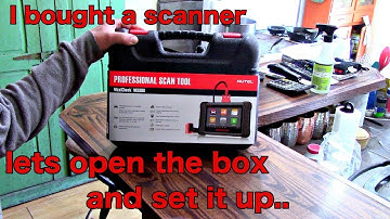 Opening box and initial setup of Autel MX808 all system OBD2 scanner
