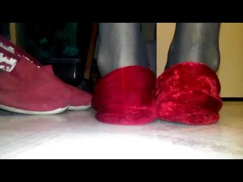 Trashed red slippers