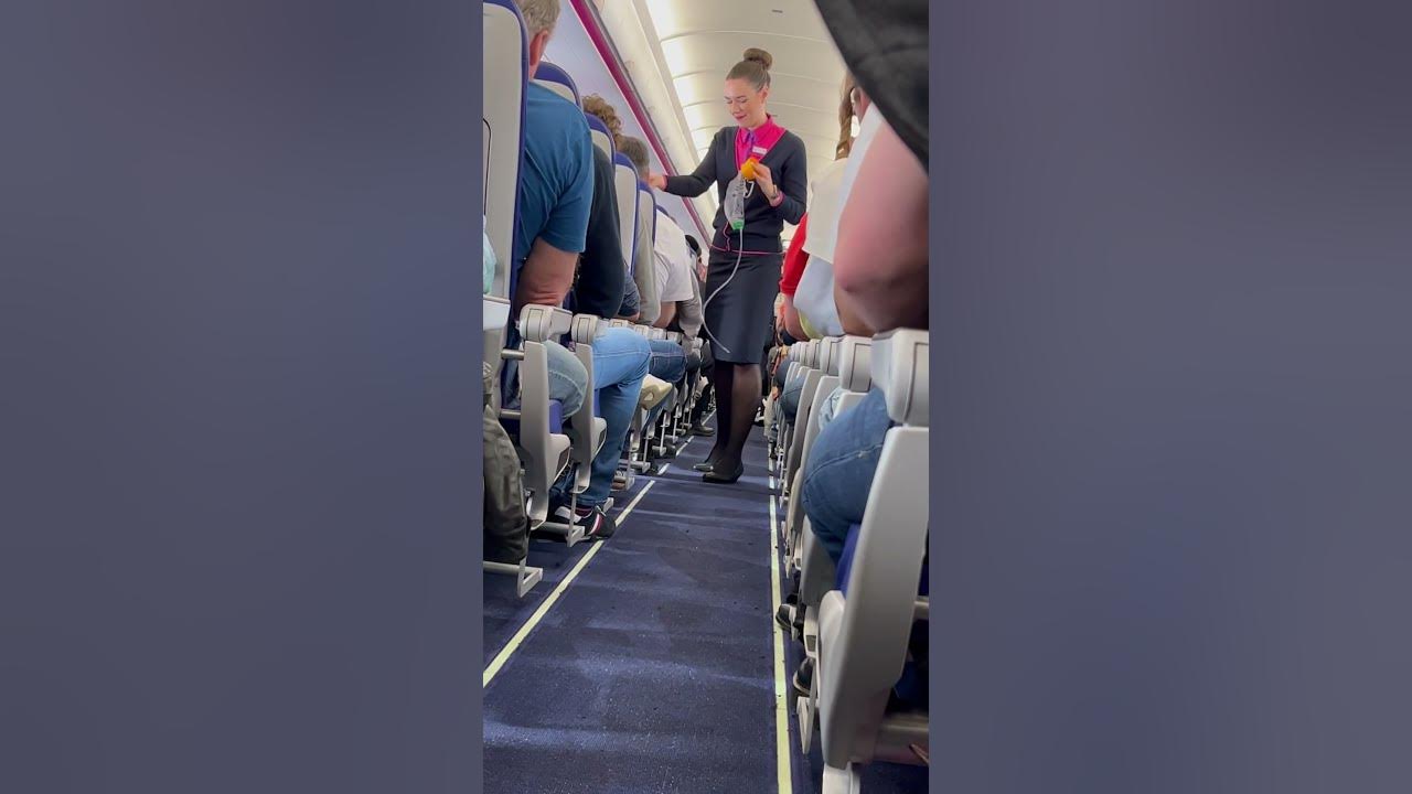 air-hostess-safety-demonstration-wizzair-youtube