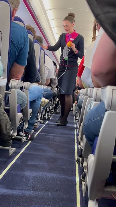 air-hostess-safety-demonstration-wizzair-youtube
