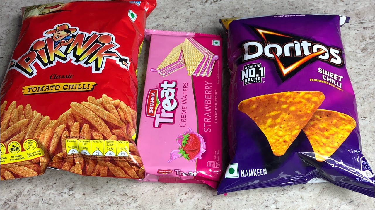 Tasty haul of chips, kurkure, lays, chocolates, doritos, cornitos, piknik, britania wafers