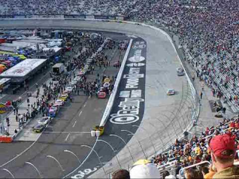 During a celebrity race at BMS in 3-21-09, Ray Evernham is chasing fellow former NASCAR crew chief Andy Petree when he wipes out on the front stretch. ESPN commentator and former NBA star Brad Daughtery is trailing close behind them.