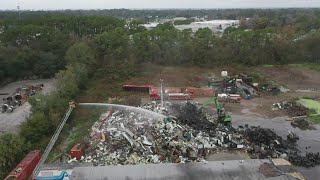 Phillips Highway reopened after recycling facility erupts in fire