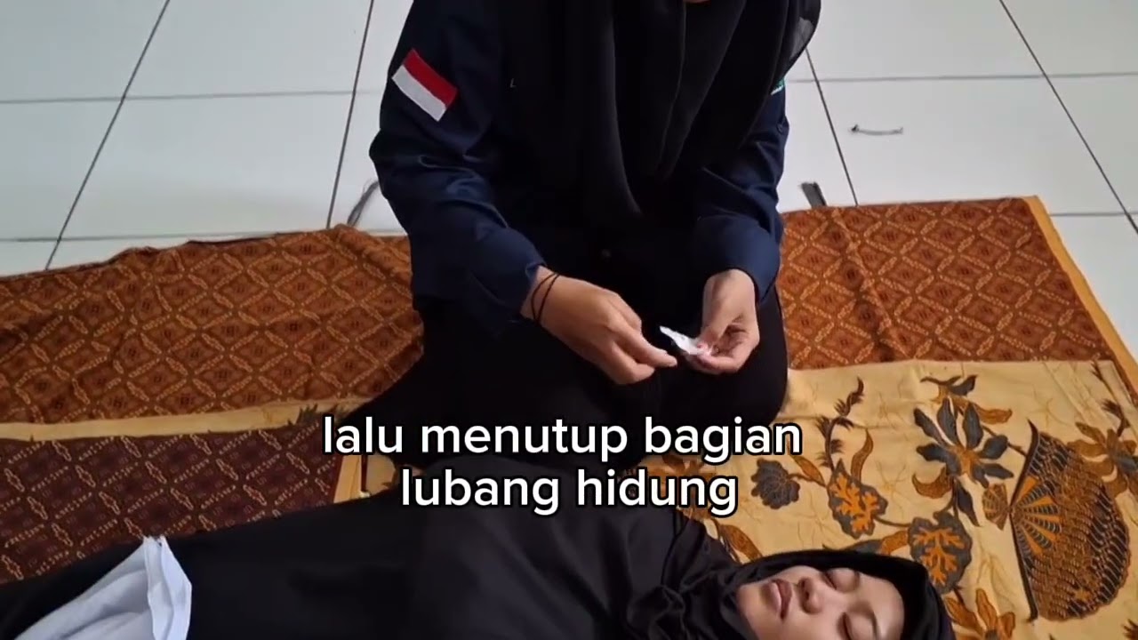 PRAKTEK MENGKAFANI JENAZAH PEREMPUAN