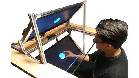 Haptic desktop force feedback with a cable interface