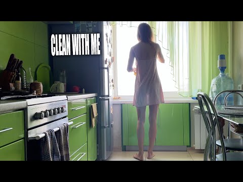 Tina in transparent dress cleaning in the home