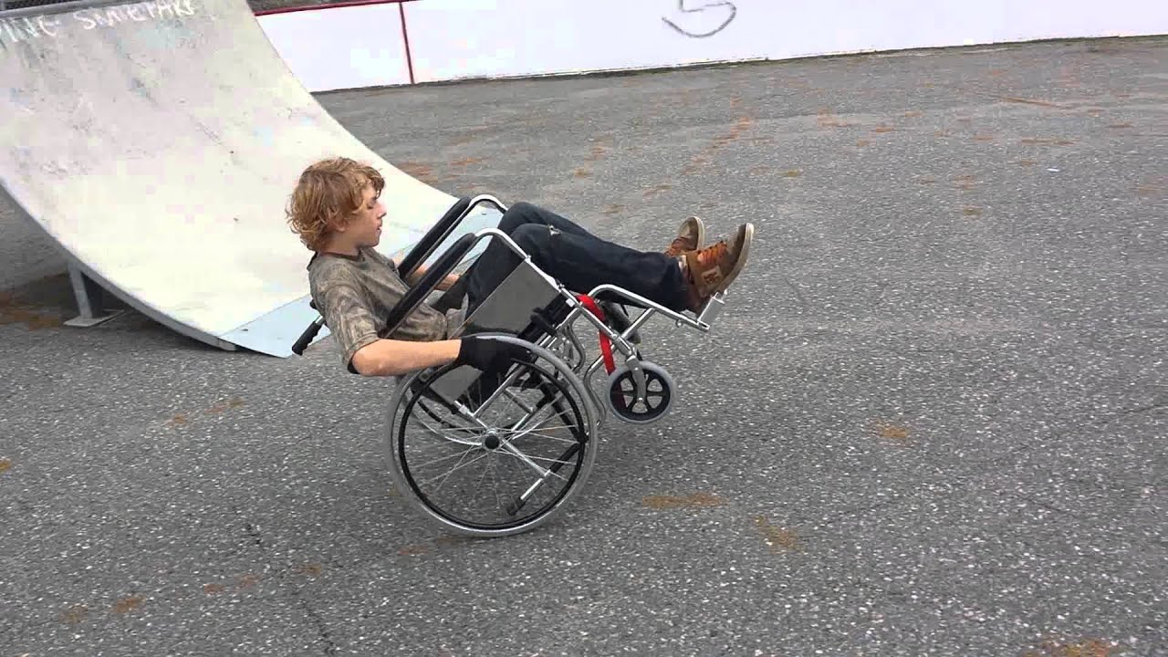 Wheelchair wheelies YouTube