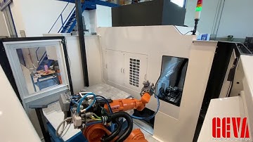 Automated robotic cell - CNC machine feeding