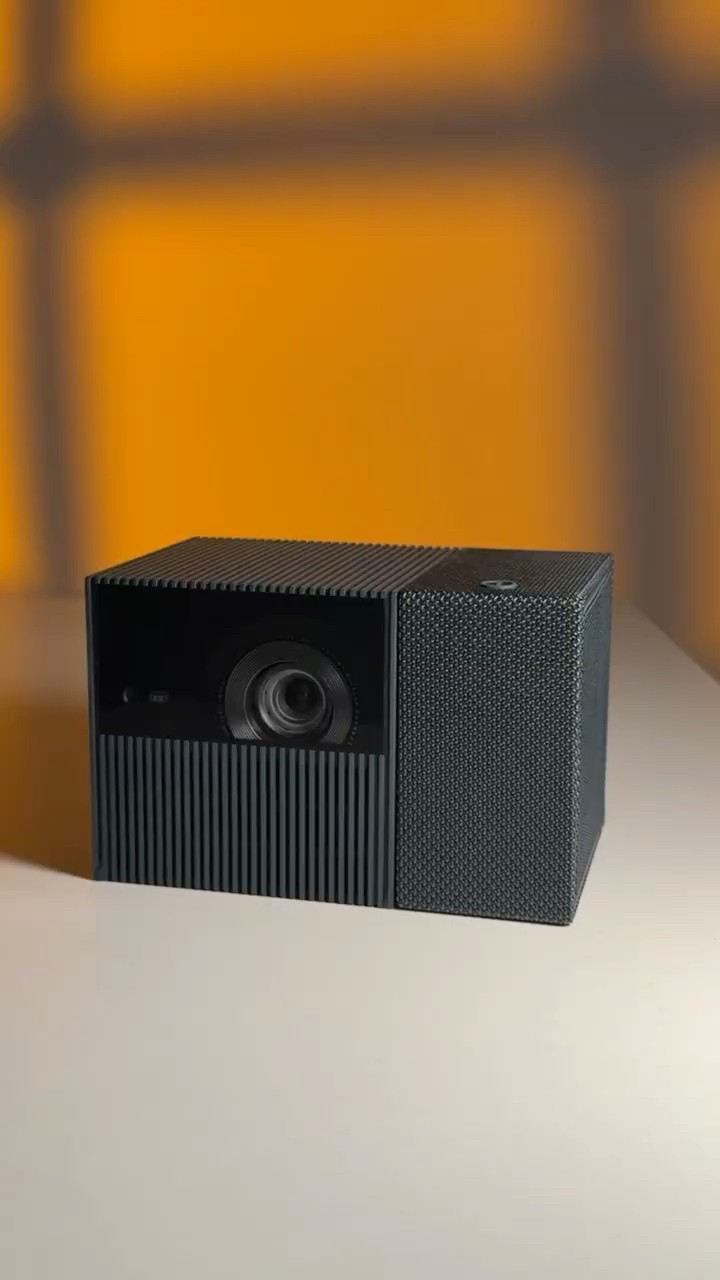 This mini projector for outdoor movies is an absolute game-changer