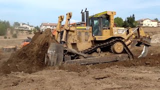 CAT D10T Dozer pushing and ripping dirt -  Great operator