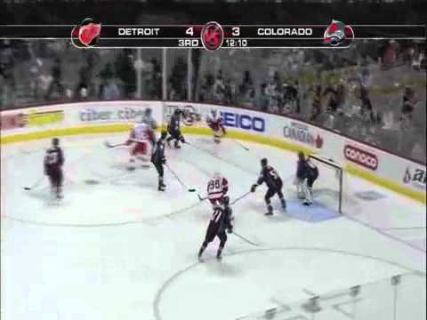 Peter Forsberg runs over Niklas Kronwall