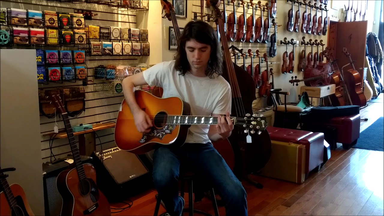 Sean Davis demos a Gibson Hummingbird HC at Goat Peak Strings