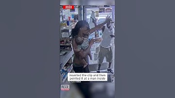 Dad Holding Baby Fights Off Gunman #shorts