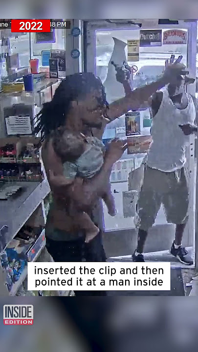 Dad Holding Baby Fights Off Gunman #shorts