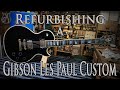 Refurbishing a Gibson Les Paul Custom.