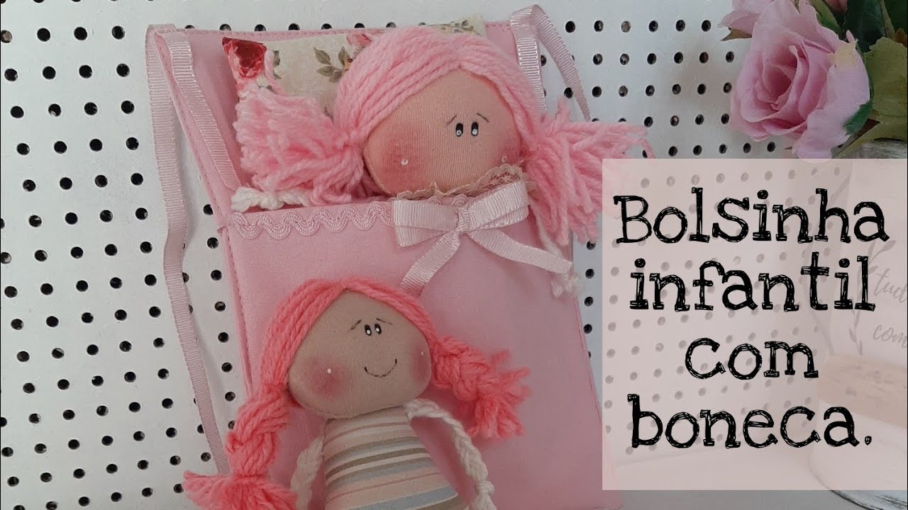 Bolsa infantil com boneca.  Bolsinha infantil com boneca.