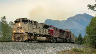 CP 7021 Arid Regions Veteran SD70ACu leads a huge 14,000ft long CP 199 west at Canmore, Alberta