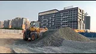 Front end loader backhoe bucket work operator doing.