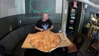 Ravintola Siilinpesä's Family-Sized "Sukupizza" Pizza Challenge