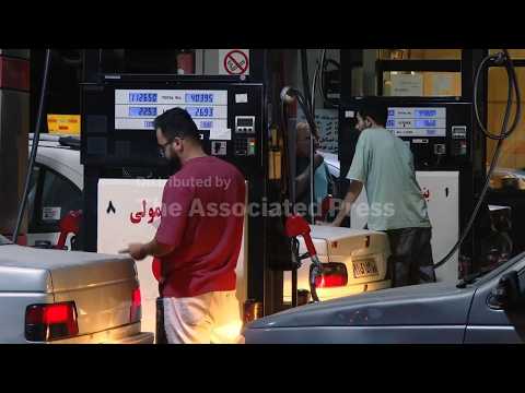 Reaction in Tehran as Iran increases gasoline price for its heaviest consumers as economy struggles