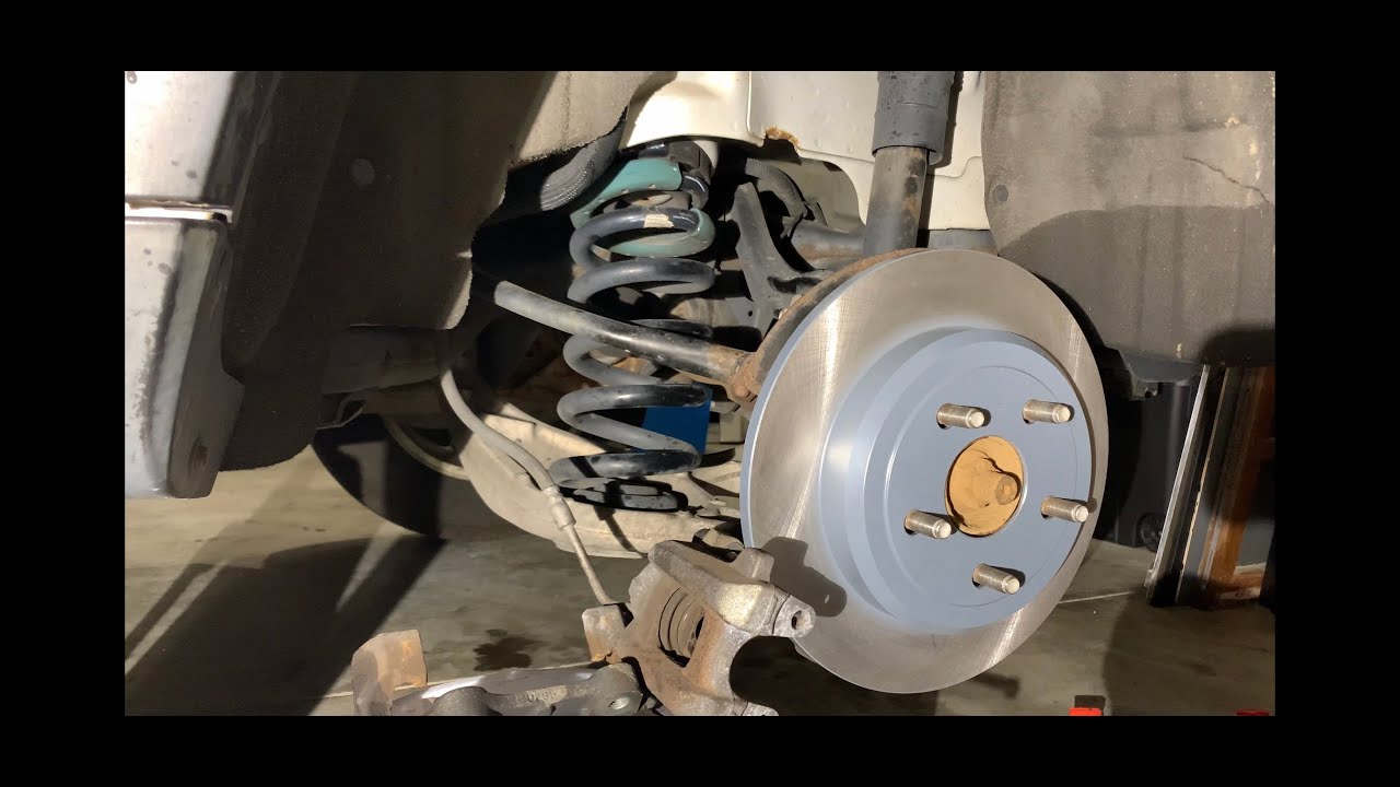 How to replace brake rotors and pads on Jeep Grand Cherokee Laredo 2011