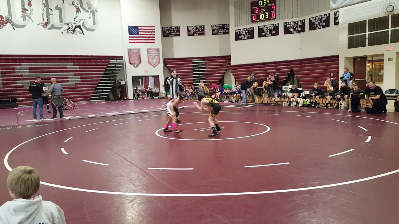 Jaxon Crew Grandville duals, double chickenwing pin. Wrestling up to