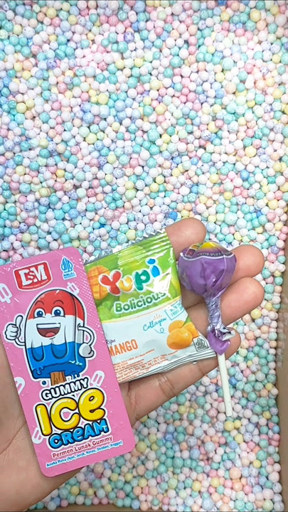 hunting lolipop 🍭🍓 candy 🍬 in styrofoam granules #shortvideo #candy #reversevideos_