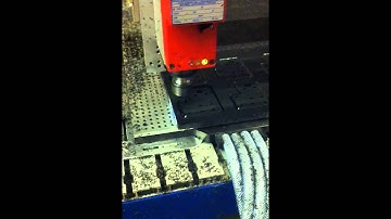 CNC router machining acetal parts on vacuum table