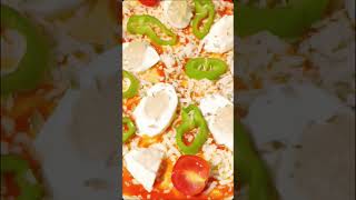 Pizza de mozzarella, emmental, pimiento, tomate cherry y cebolla caramelizada. #pizza