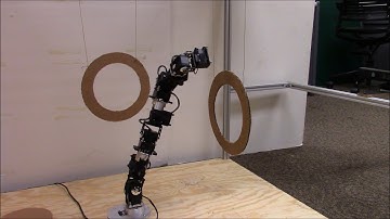 Path planning of 9-DOF hyper-redundant arm through cylindrical objects