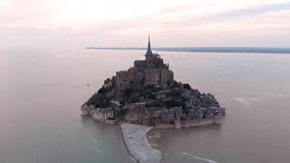 Le Mont Saint Michel France Drone 4k video. Sunset and high Tide
