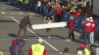 Weini Kelati wins the Women's Championship at the 89th Manchester Road race